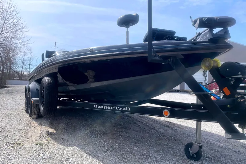 Slide: The Image of 2017 Ranger Z520 boat on trailer, parked outdoors on gravel. - 13