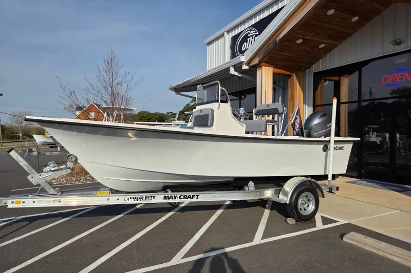 The Image of 2026 May-Craft 182 Center Console boat on trailer outside dealership. - 0