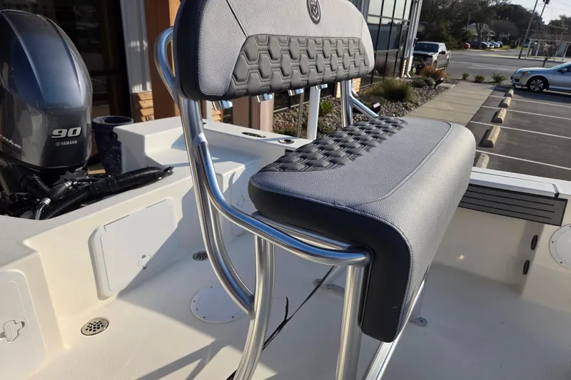 Slide: The Image of 2026 May-Craft 182 Center Console boat with Yamaha 90 engine, featuring sleek seating design. - 11
