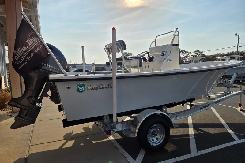 Slide: The Image of 2026 May-Craft 182 Center Console boat on trailer, displayed outdoors. - 6