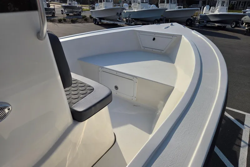 Slide: The Image of 2026 May-Craft 182 Center Console boat interior with seating and storage compartments. - 7