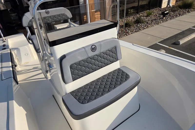 Slide: The Image of 2026 May-Craft 182 Center Console boat interior with cushioned seating and console details. - 8