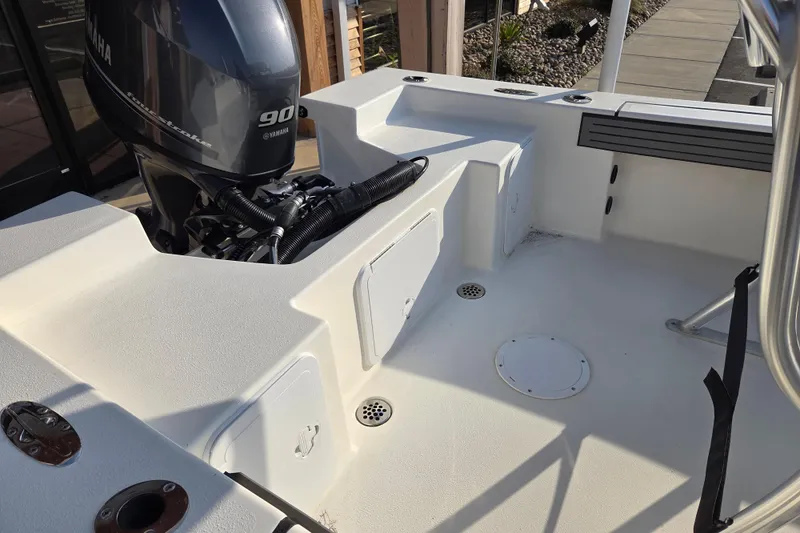 Slide: The Image of 2026 May-Craft 182 Center Console boat with Yamaha 90 outboard motor, rear deck view. - 9