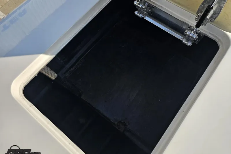 Slide: The Image of Open storage compartment on a 2009 Nordic 36 Hurricane boat. - 100