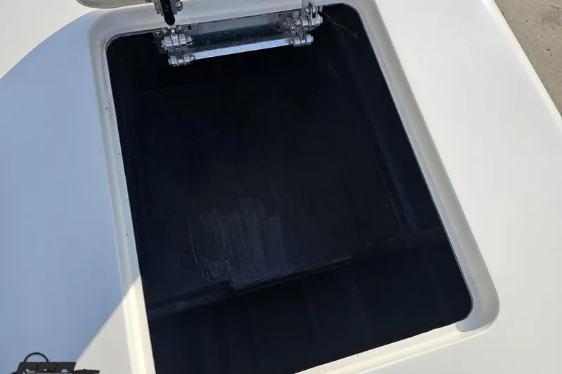 Slide: The Image of Open storage compartment on a 2009 Nordic 36 Hurricane boat. - 101
