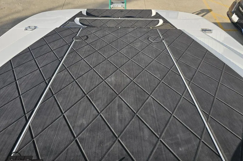 Slide: The Image of 2009 Nordic 36 Hurricane boat deck with diamond-patterned non-slip surface. - 108