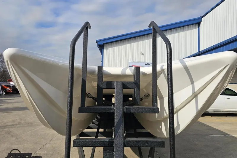 Slide: The Image of Nordic 36 Hurricane 2009 boat hull on display with metal stairs in foreground. - 11