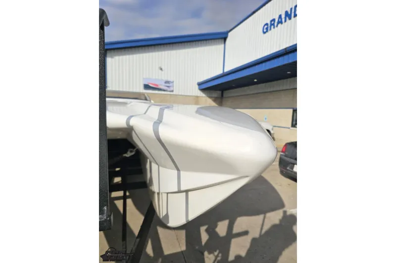 Slide: The Image of 2009 Nordic 36 Hurricane boat bow at dealership, showcasing sleek design. - 15