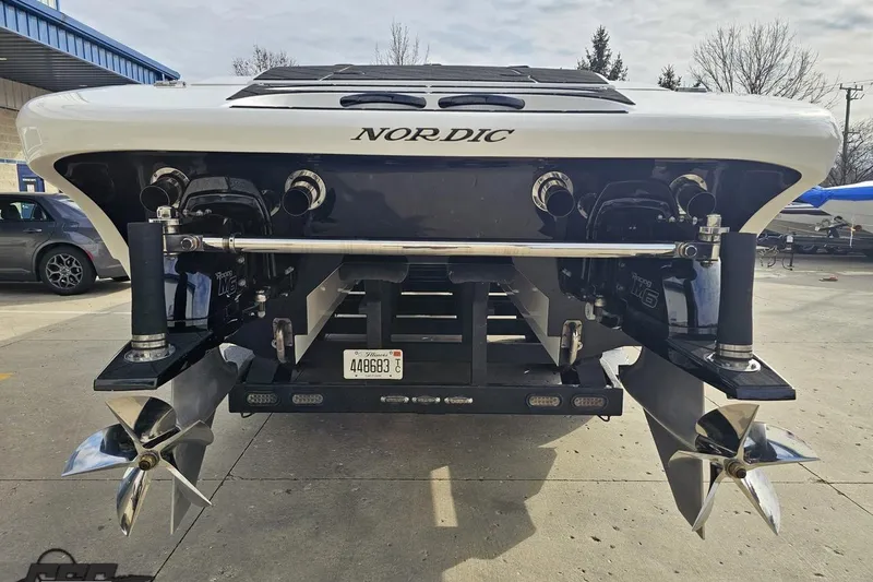 Slide: The Image of Rear view of a 2009 Nordic 36 Hurricane boat with dual propellers. - 25