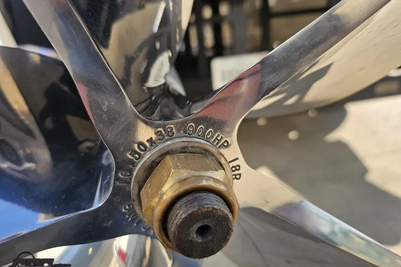 Slide: The Image of Close-up of a 2009 Nordic 36 Hurricane boat propeller with specifications engraved. - 28