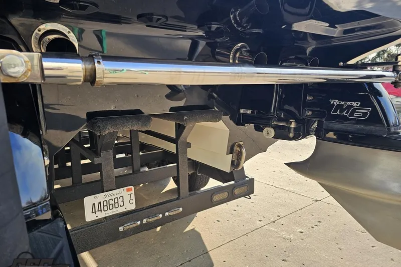 Slide: The Image of Close-up of a 2009 Nordic 36 Hurricane boat's rear with Illinois license plate. - 29