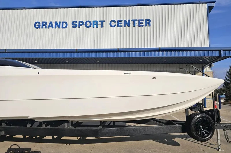 Slide: The Image of 2009 Nordic 36 Hurricane boat at Grand Sport Center, displayed on a trailer. - 3