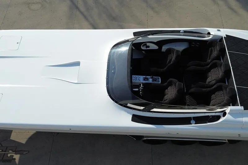 Slide: The Image of Overhead view of a 2009 Nordic 36 Hurricane speedboat with sleek design and seating. - 45