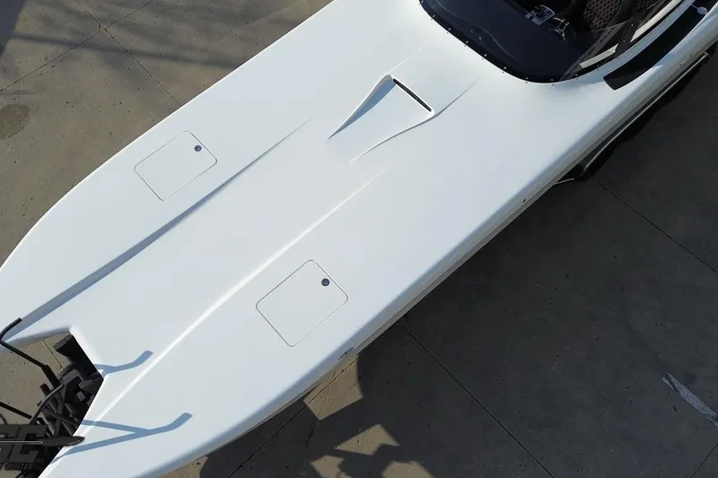 Slide: The Image of 2009 Nordic 36 Hurricane boat, aerial view of sleek white deck design. - 46