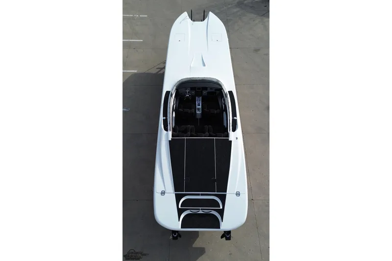 Slide: The Image of Aerial view of 2009 Nordic 36 Hurricane speedboat, showcasing sleek design and cockpit layout. - 49