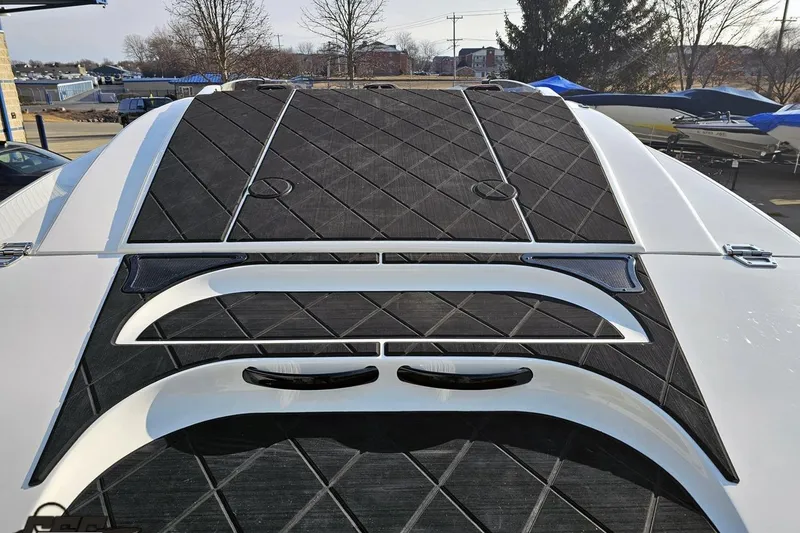 Slide: The Image of 2009 Nordic 36 Hurricane boat deck with black diamond-patterned padding. - 68