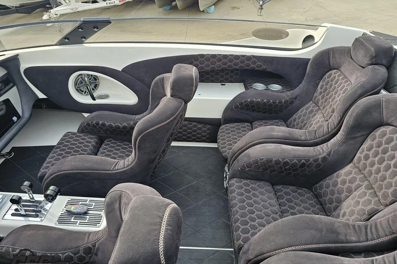 Slide: The Image of Luxurious interior of a 2009 Nordic 36 Hurricane boat with plush seating and modern controls. - 75