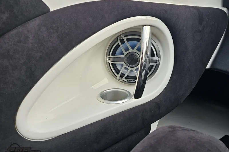 Slide: The Image of Speaker and handle detail in 2009 Nordic 36 Hurricane boat interior. - 94