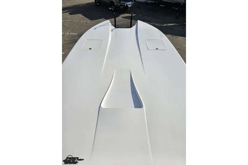 Slide: The Image of 2009 Nordic 36 Hurricane boat deck, sleek white design, viewed from above. - 97