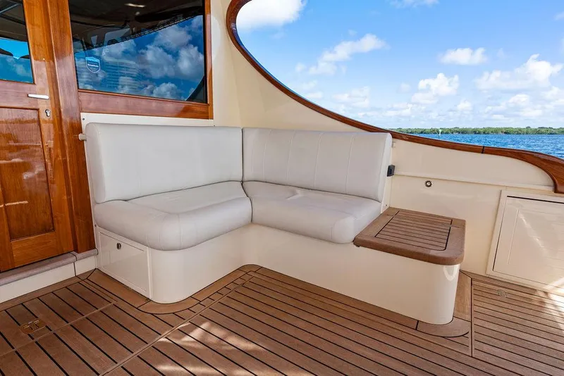 Slide: The Image of Luxurious seating area on 2018 Palm Beach Motor Yachts PB55 Flybridge with ocean view. - 14