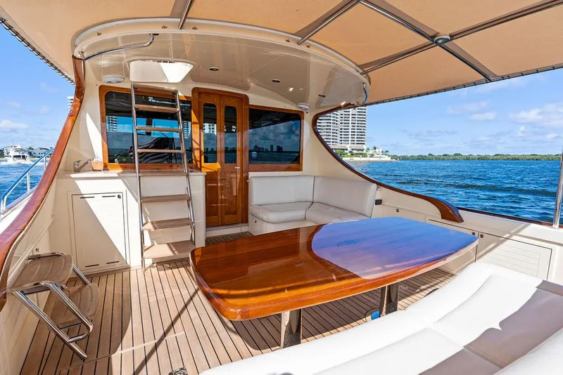 Slide: The Image of 2018 Palm Beach Motor Yachts PB55 Flybridge with elegant deck and ocean view. - 17