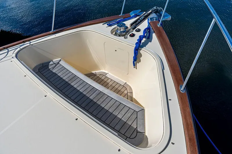 Slide: The Image of 2018 Palm Beach Motor Yachts PB55 Flybridge bow with anchor and teak decking. - 21