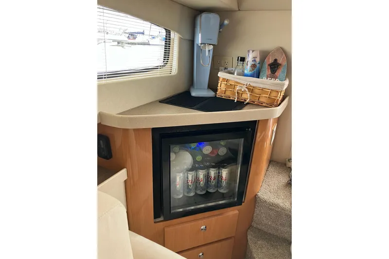 Slide: The Image of Mini fridge and countertop in 2001 Regal Commodore 3780 yacht interior. - 28