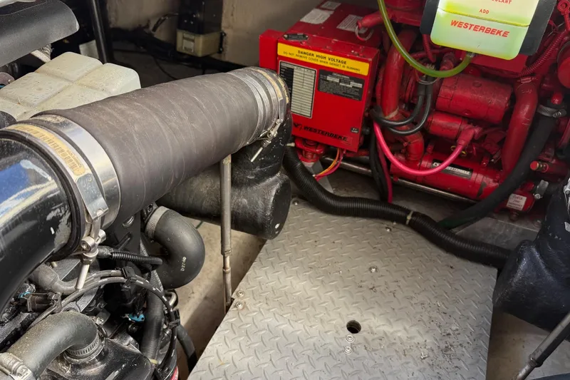 Slide: The Image of Engine compartment of a 2001 Regal Commodore 3780 with visible Westerbeke generator. - 42