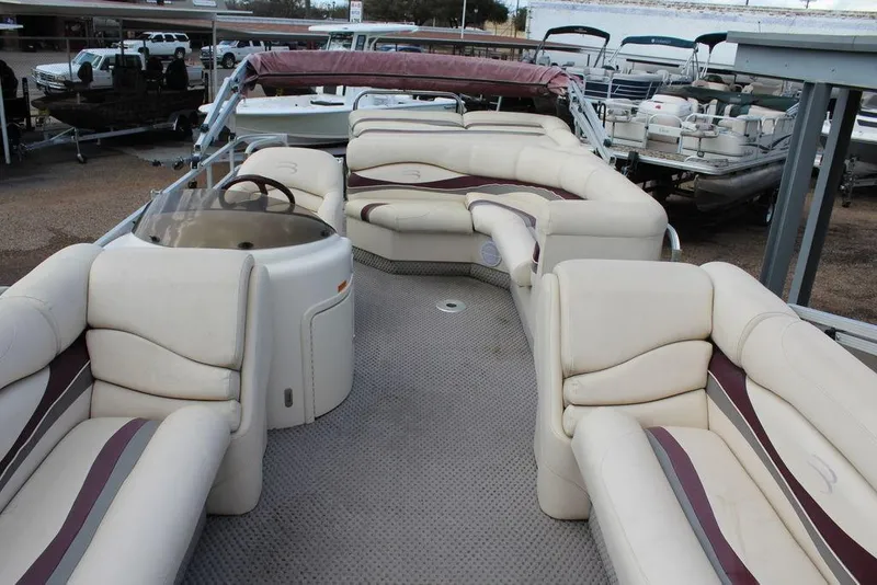 Slide: The Image of 2005 Bennington 2275 RL pontoon boat with spacious seating and elegant design. - 10