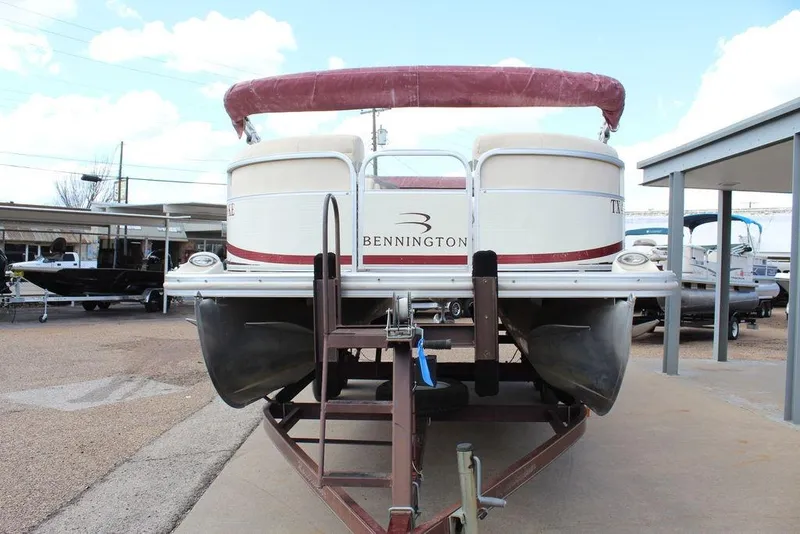 Slide: The Image of 2005 Bennington 2275 RL pontoon boat on trailer, outdoor display. - 11