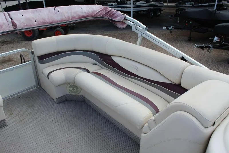 Slide: The Image of 2005 Bennington 2275 RL pontoon boat with beige and maroon seating. - 15
