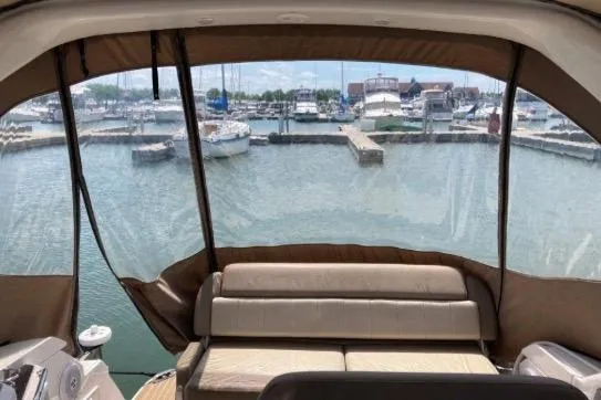 Slide: The Image of Interior view of 2013 Regal 30 Express yacht overlooking marina. - 11