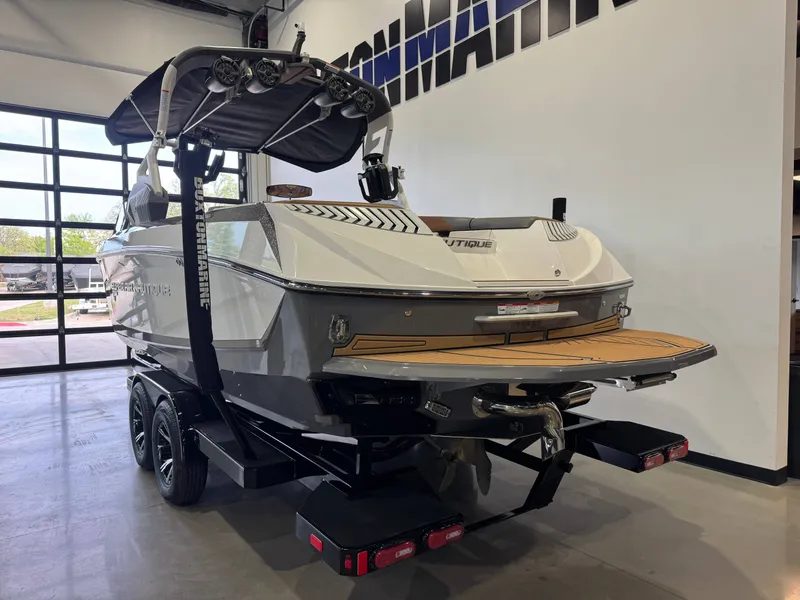 Slide: The Image of 2019 Nautique Super Air Nautique G25 on trailer in showroom. - 5