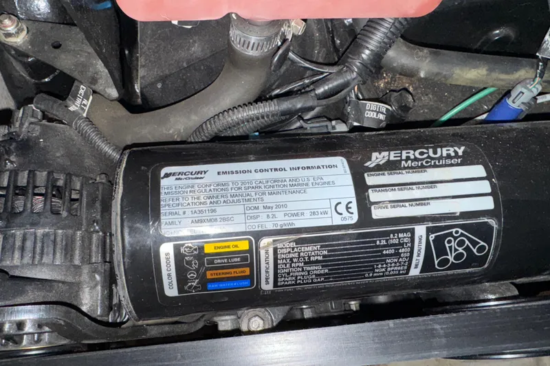 Slide: The Image of Mercury MerCruiser engine label on 2010 Sea Ray Sundancer 280 boat. - 26