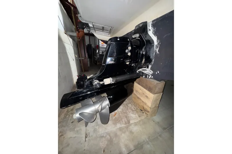 Slide: The Image of 2010 Sea Ray Sundancer 280 boat propeller and stern drive in storage. - 27