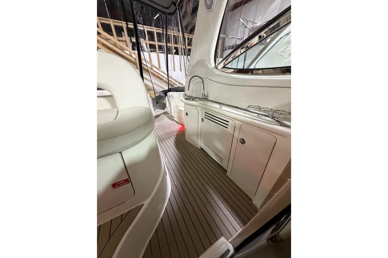 Slide: The Image of 2005 Sea Ray 360 Sundancer interior with sleek cabinetry and modern design. - 32