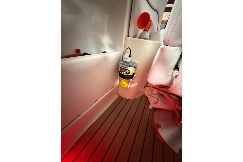 Slide: The Image of Interior of 2005 Sea Ray 360 Sundancer with safety equipment and wooden flooring. - 42