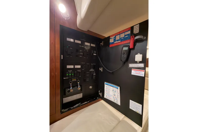 Slide: The Image of Electrical panel inside a 2005 Sea Ray 360 Sundancer yacht cabin. - 46