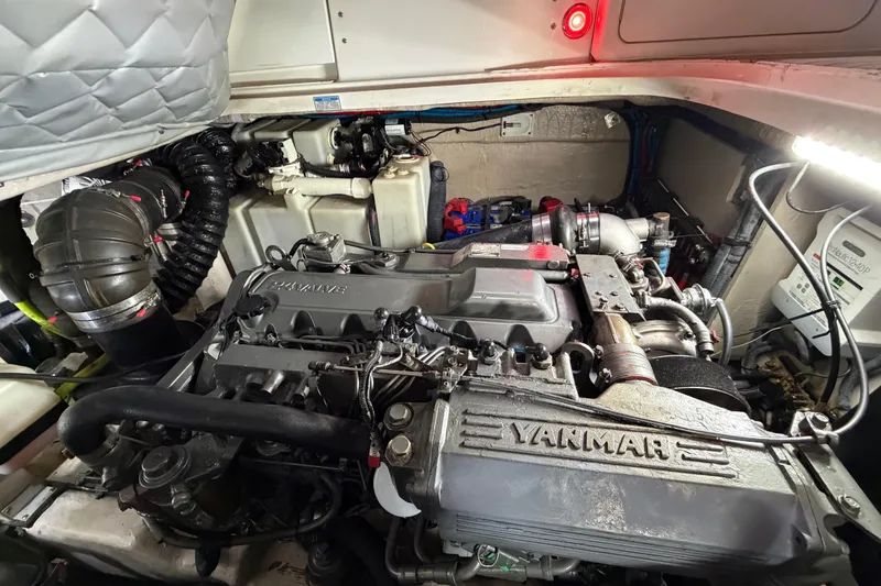 Slide: The Image of Engine room of a 2005 Sea Ray 360 Sundancer with Yanmar engine components. - 57