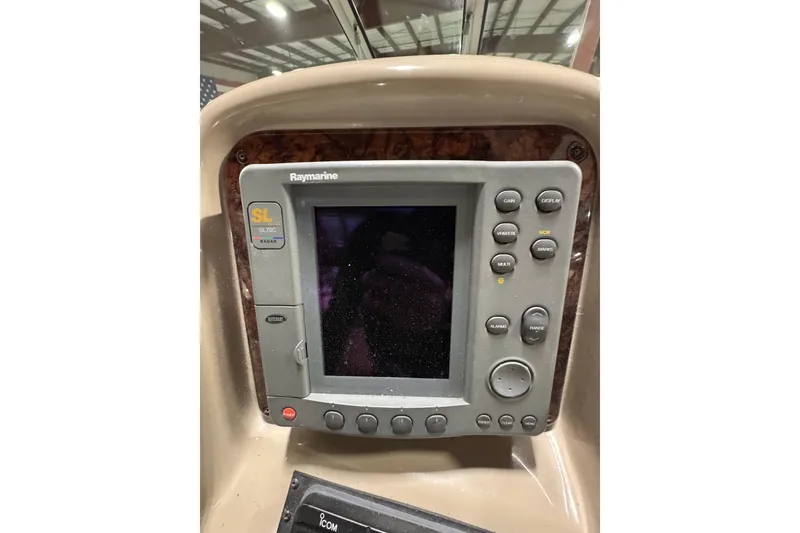 Slide: The Image of Raymarine SL70C radar display on 2004 Sea Ray Sundancer 320 boat dashboard. - 43