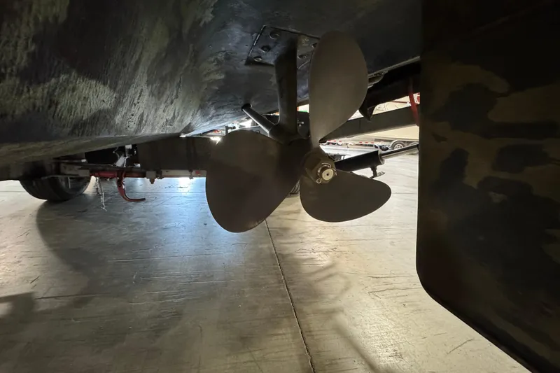 Slide: The Image of Propeller of a 2004 Sea Ray Sundancer 320 boat in a garage setting. - 67