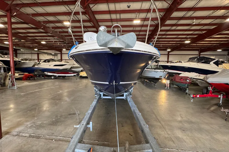 Slide: The Image of 2004 Sea Ray Sundancer 320 boat in indoor storage facility. - 75
