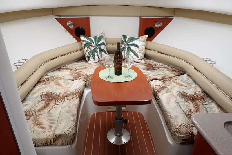 Slide: The Image of Luxurious 2014 Pro-Line 32 Express cabin interior with tropical decor and cozy seating. - 10