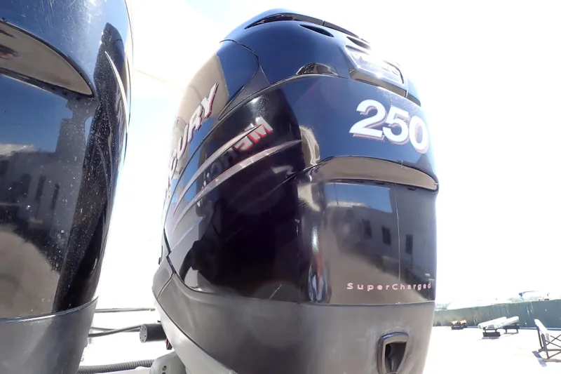 Slide: The Image of Mercury 250 Supercharged outboard engines on a 2014 Pro-Line 32 Express boat. - 110