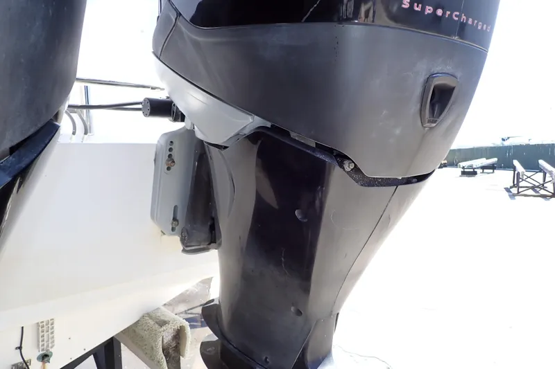 Slide: The Image of 2014 Pro-Line 32 Express boat with a supercharged outboard motor. - 111