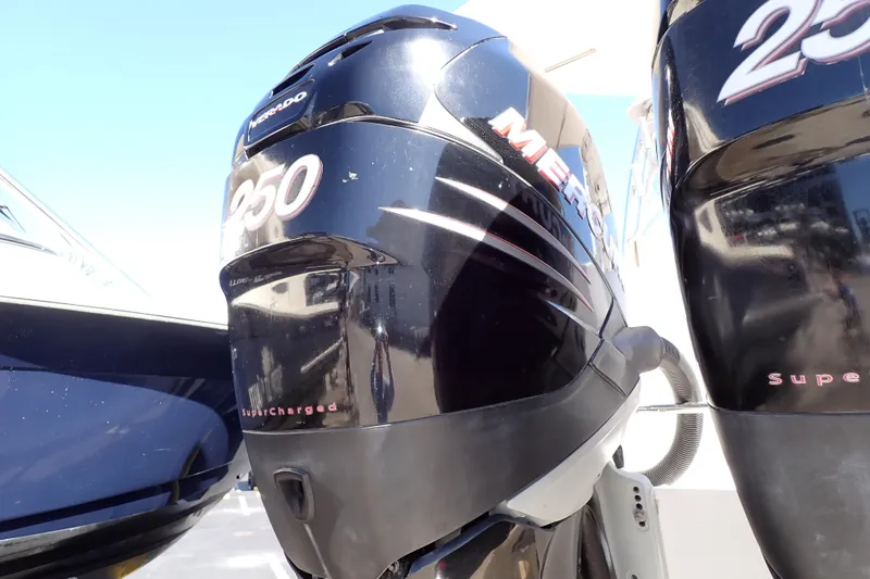 Slide: The Image of Mercury 250 supercharged outboard engine on 2014 Pro-Line 32 Express boat. - 113