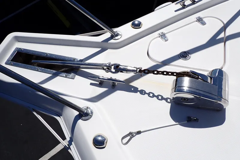 Slide: The Image of Bow of 2014 Pro-Line 32 Express boat with anchor chain and winch system. - 17