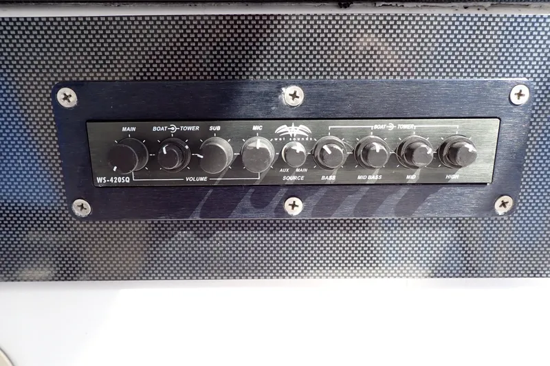 Slide: The Image of Audio control panel on a 2014 Pro-Line 32 Express boat. - 23