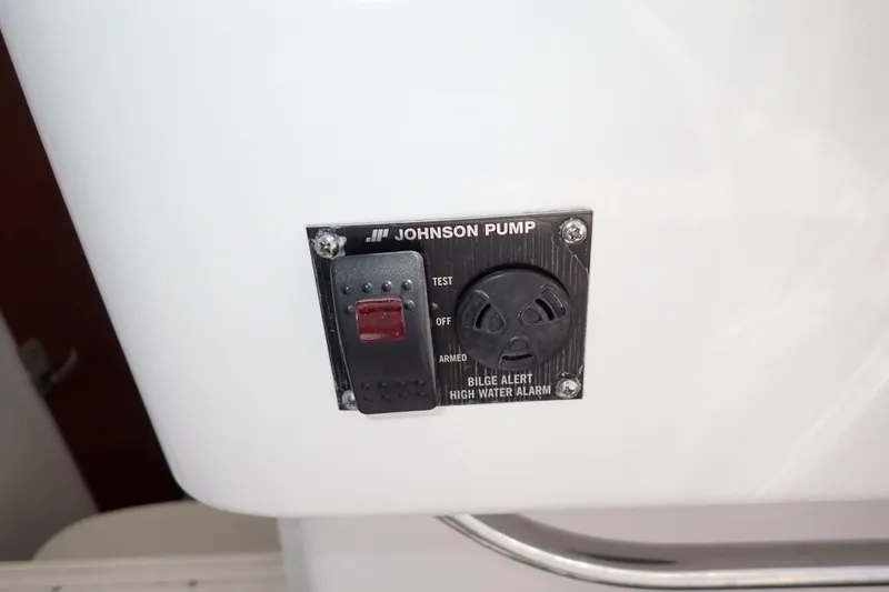 Slide: The Image of Johnson Pump bilge alert high water alarm on 2014 Pro-Line 32 Express boat. - 28