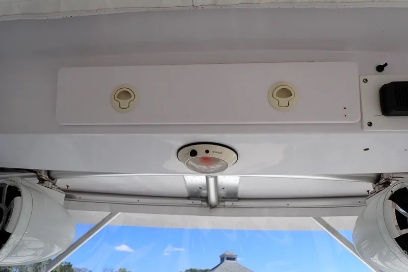 Slide: The Image of 2014 Pro-Line 32 Express boat interior ceiling with speakers and lighting. - 39